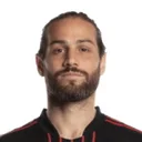 Alex De John
